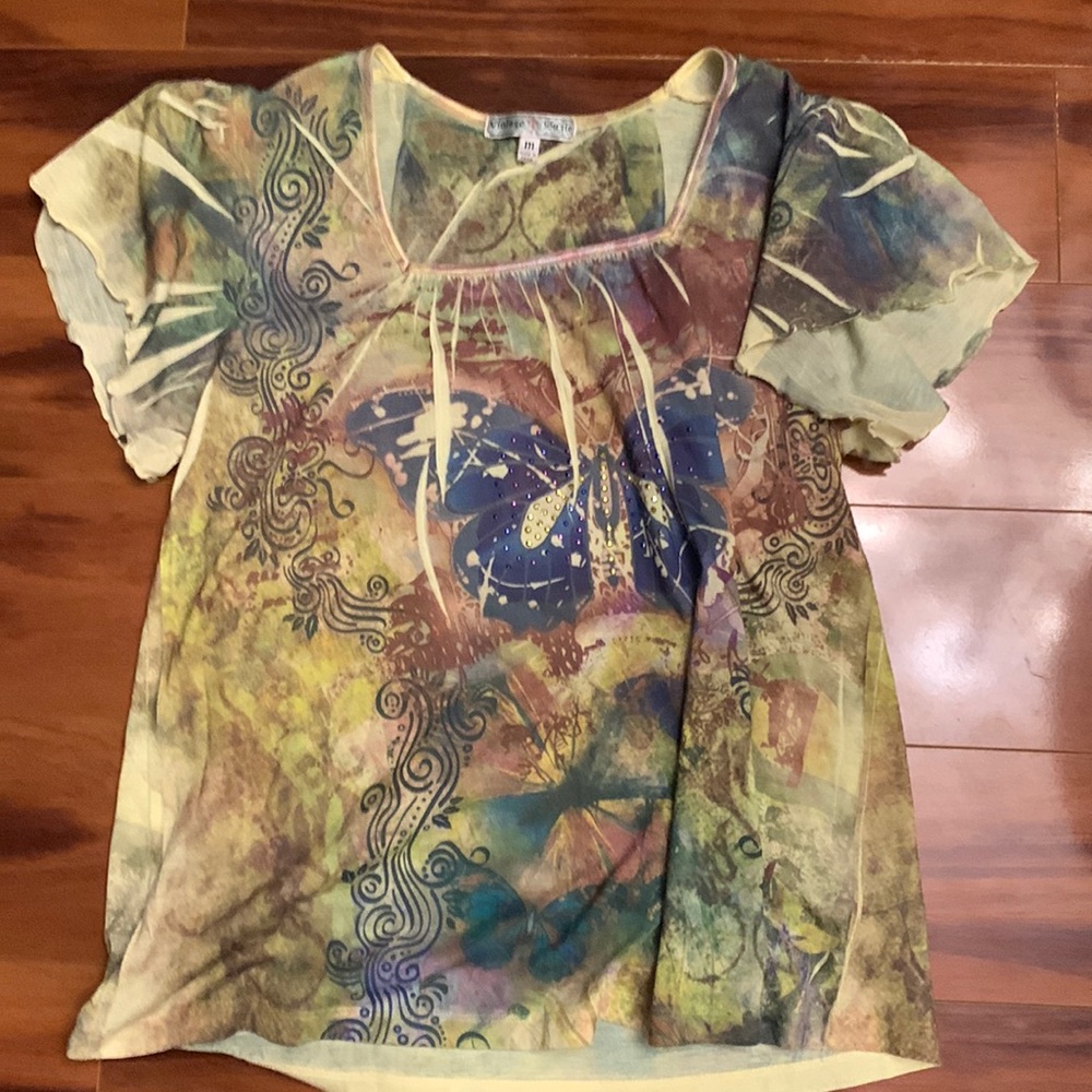 Multicolored shirt made by Vintage Suzie, size medium.